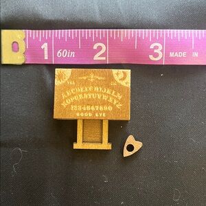 Miniature Ouija board with planchette